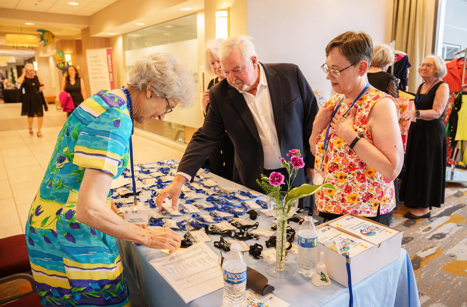 Guests looking over displays at the 2026 FISH Fling