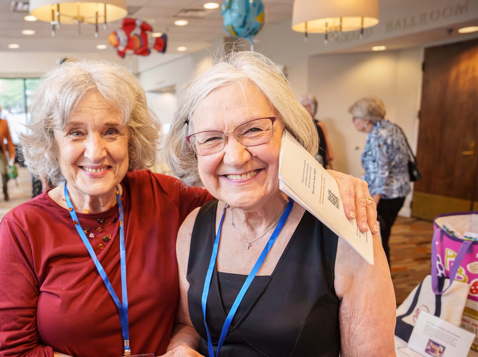 Two smiling guests at the 2026 FISH Fling